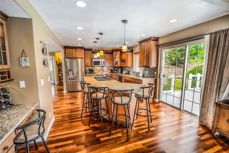 A clean and organized kitchen with sparkling countertops and gleaming floors